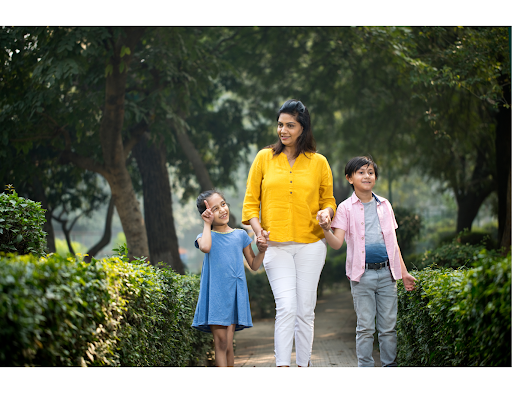 kids with parent at the park